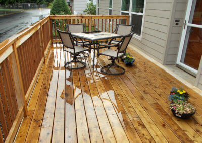 newly remodeled wood deck in the rain