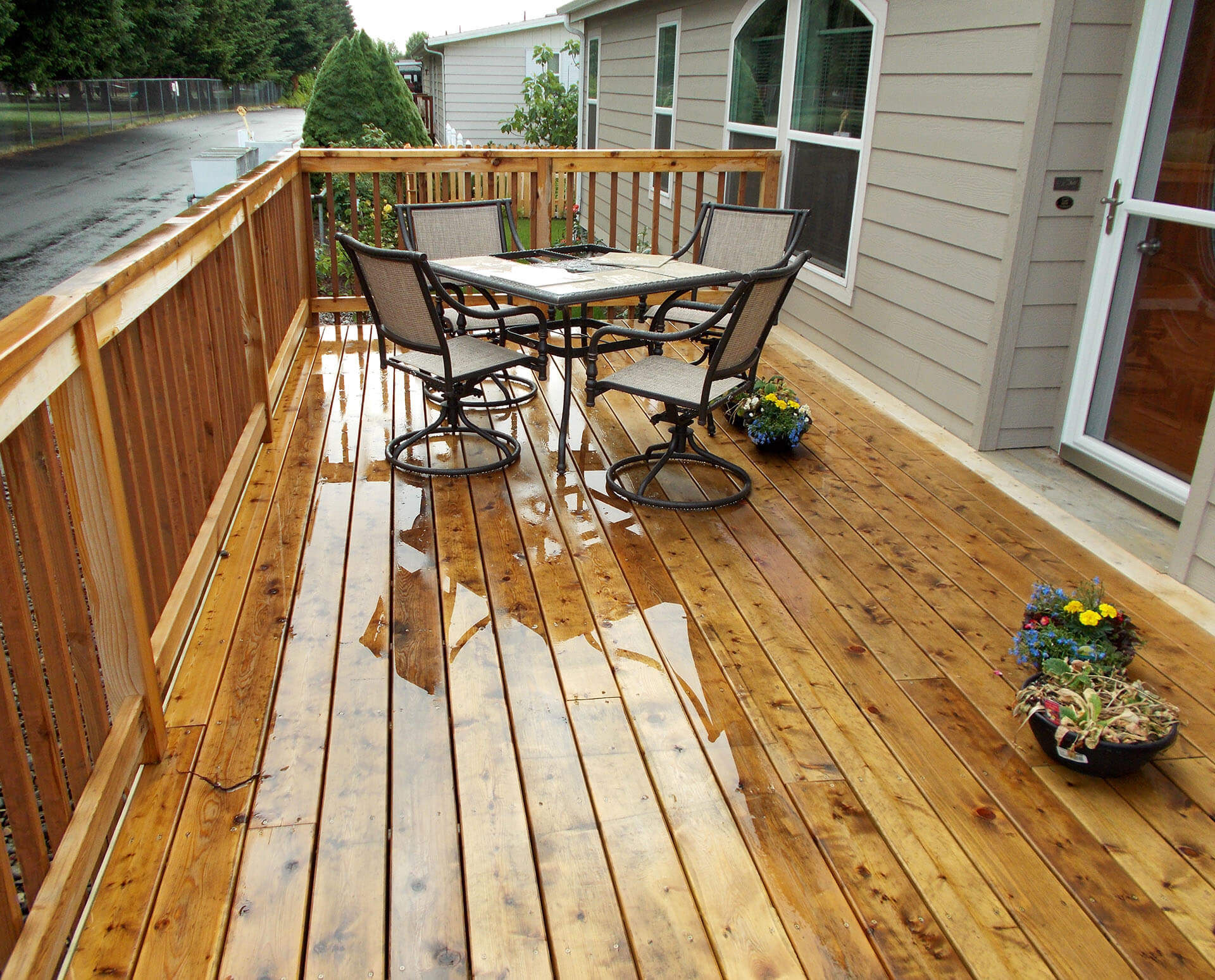 newly remodeled wood deck in the rain